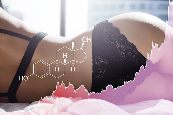 This image is featured in the 'Premenopause vs Perimenopause: Symptoms, Treatment, and More' post on PatchMD - Vitamin Patches and Supplements. It portrays a woman reviewing a chart displaying fertility and conception information during perimenopause, labeled 'Premenopause vs. Perimenopause'