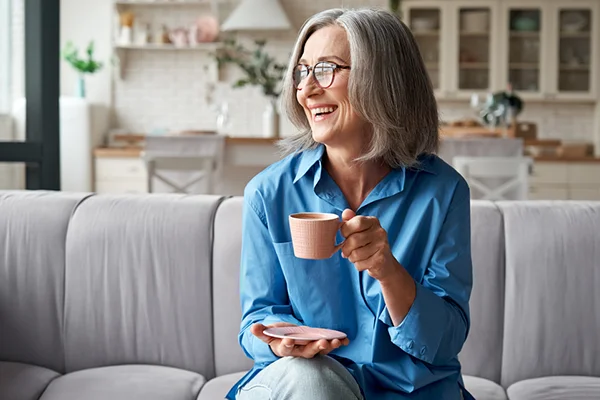 Image for the 'How to Reverse Thinning Hair After Menopause - An Expert Guide' post by PatchMD - Vitamin Patches and Supplements, featuring a woman with healthy and voluminous hair as a visual representation of the successful results of the guide's recommendations.