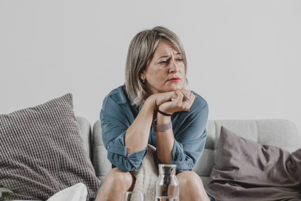 An image depicting a person feeling anxious and stressed, which can be emotional symptoms of magnesium deficiency. Learn how to test for magnesium deficiency at home.